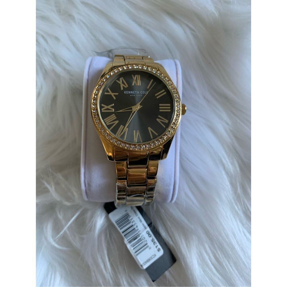 Kenneth cole women’s gold watch with little diamonds new battery